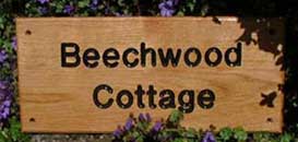 carved oak sign