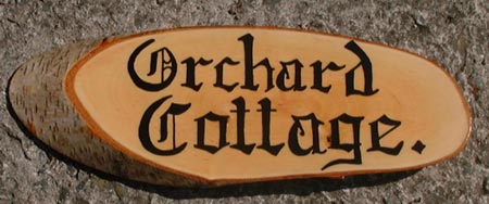 hand painted rustic house sign