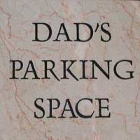 white marble house sign