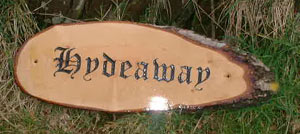 wooden house signs
