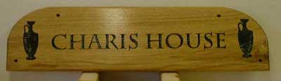 carved wooden signs