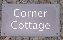 slate sign with raised letters
