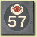 slate house number with motif