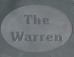 slate sign with raised letters