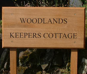 carved wooden sign